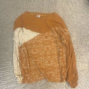 Handmade hand woven brown long-sleeved shirt with a patchwork design featuring L